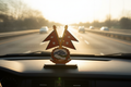 Nepal Flag Ornament on Car Dashboard